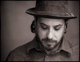 Danny Schmidt B&W with guitar